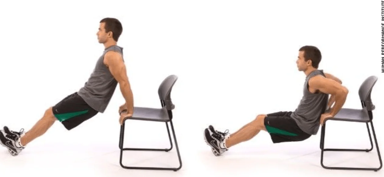 Man doing tricep dips on a chair