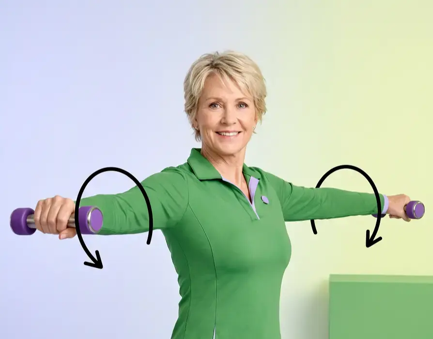 Older woman doing arm circles with light dumbbells