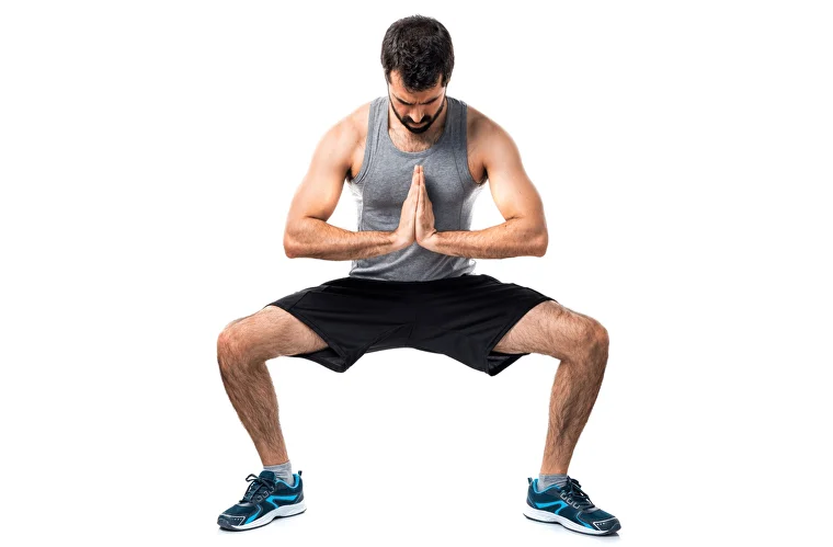 Man doing a sumo squat